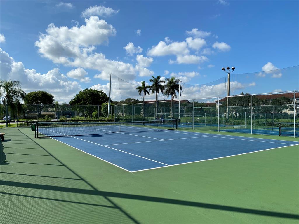 300 Southwest 134th Way, Unit E211 Pembroke Pines, FL 33027 - Photo 17 of 24 a view of a basket ball ground