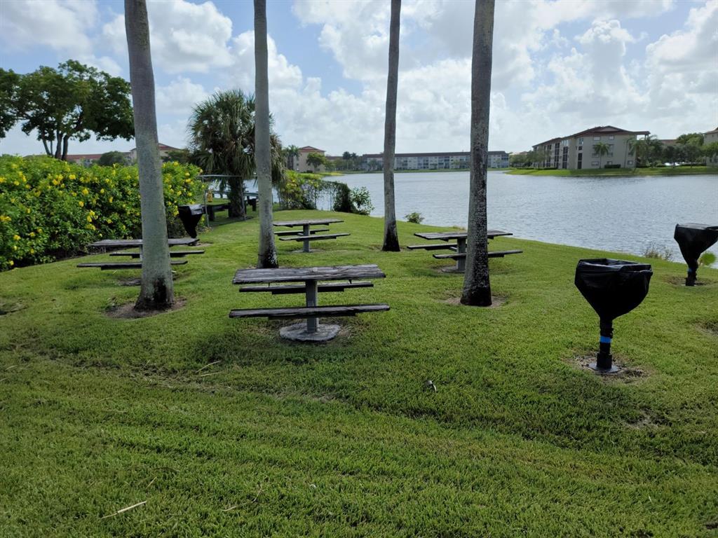 300 Southwest 134th Way, Unit E211 Pembroke Pines, FL 33027 - Photo 23 of 24 a view of a park with a slide