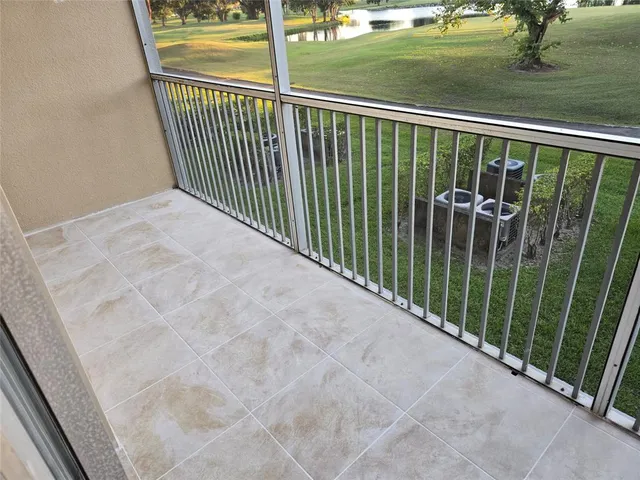 a view of a porch and a yard