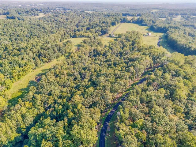 a view of a room with air conditioner and windows