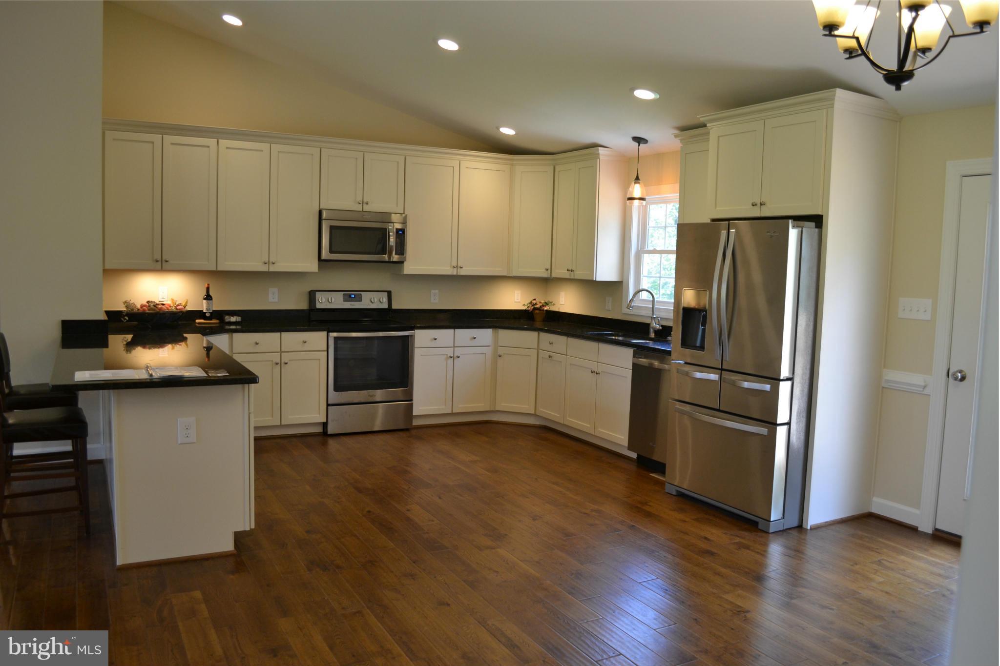 11680 Alum Springs Road Rixeyville, VA 22737 - Photo 2 of 29 Upgrade maple cabinets & granite countertops