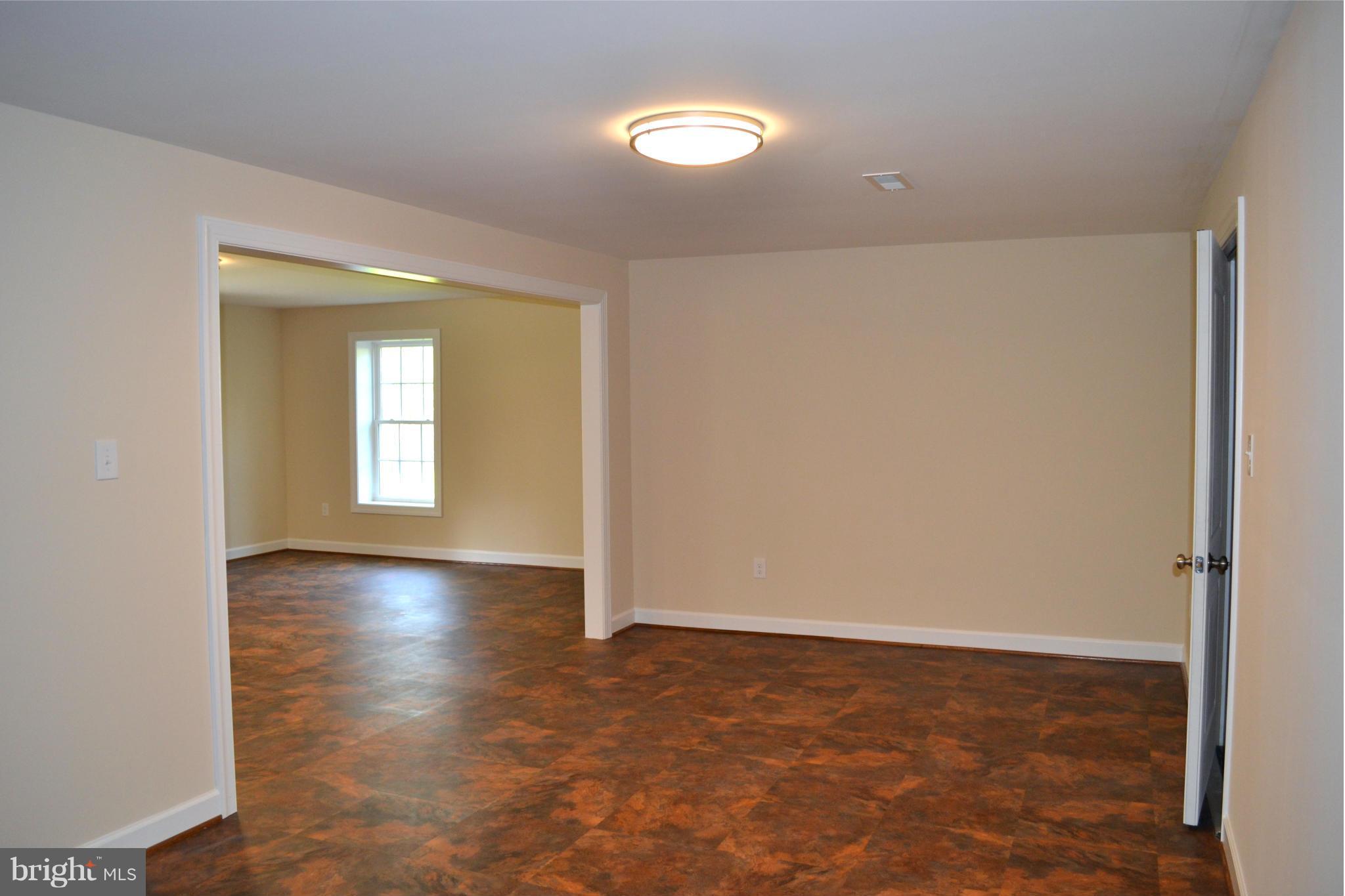 11680 Alum Springs Road Rixeyville, VA 22737 - Photo 20 of 29 Basement rec room area