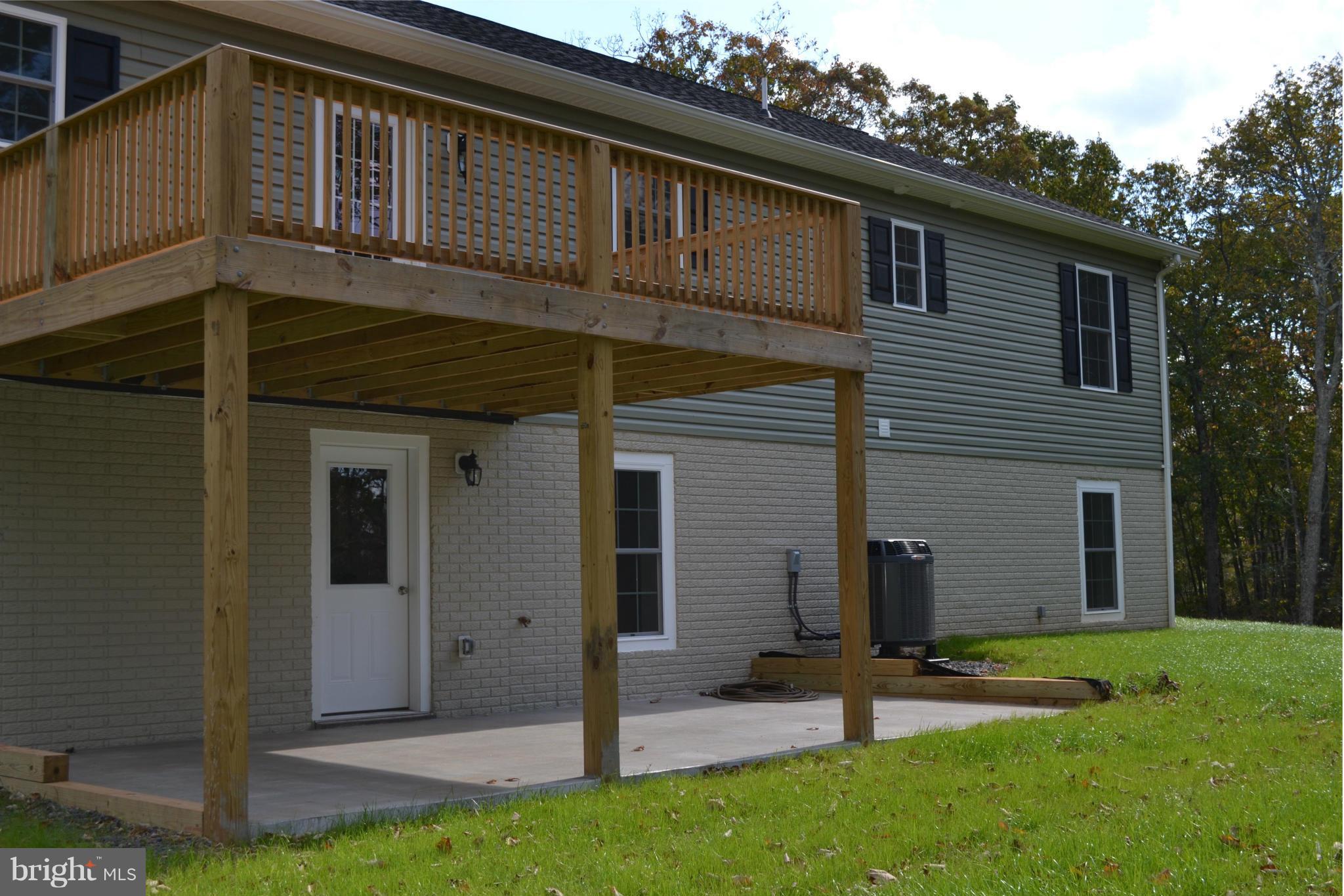 11680 Alum Springs Road Rixeyville, VA 22737 - Photo 28 of 29 rear deck with concrete patio