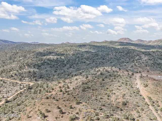 a view of an outdoor space and mountain view