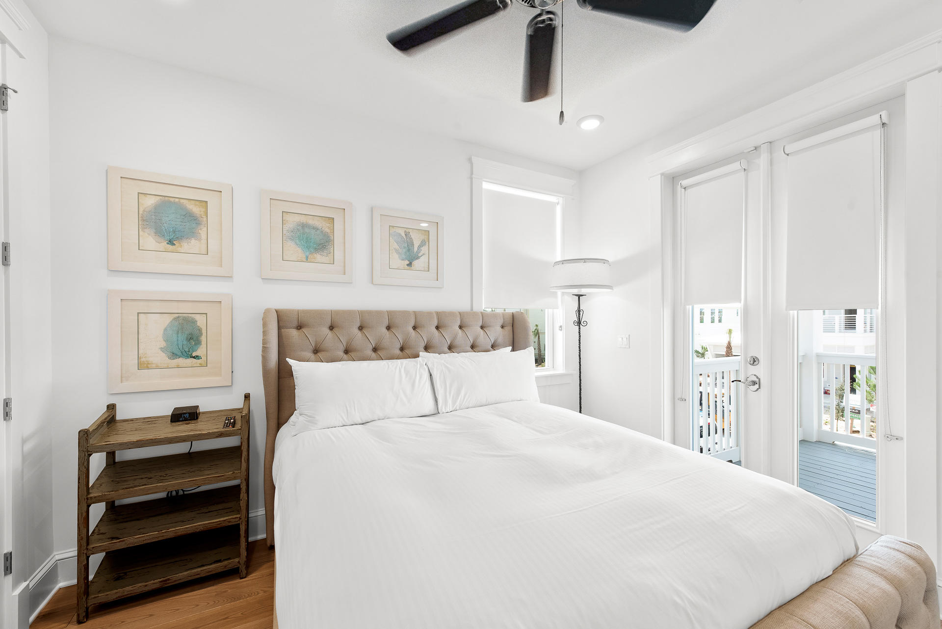 39 Candlehouse Ln Inlet Beach Inlet Beach, FL 32461 - Photo 18 of 26 a bedroom with a large bed and a chandelier