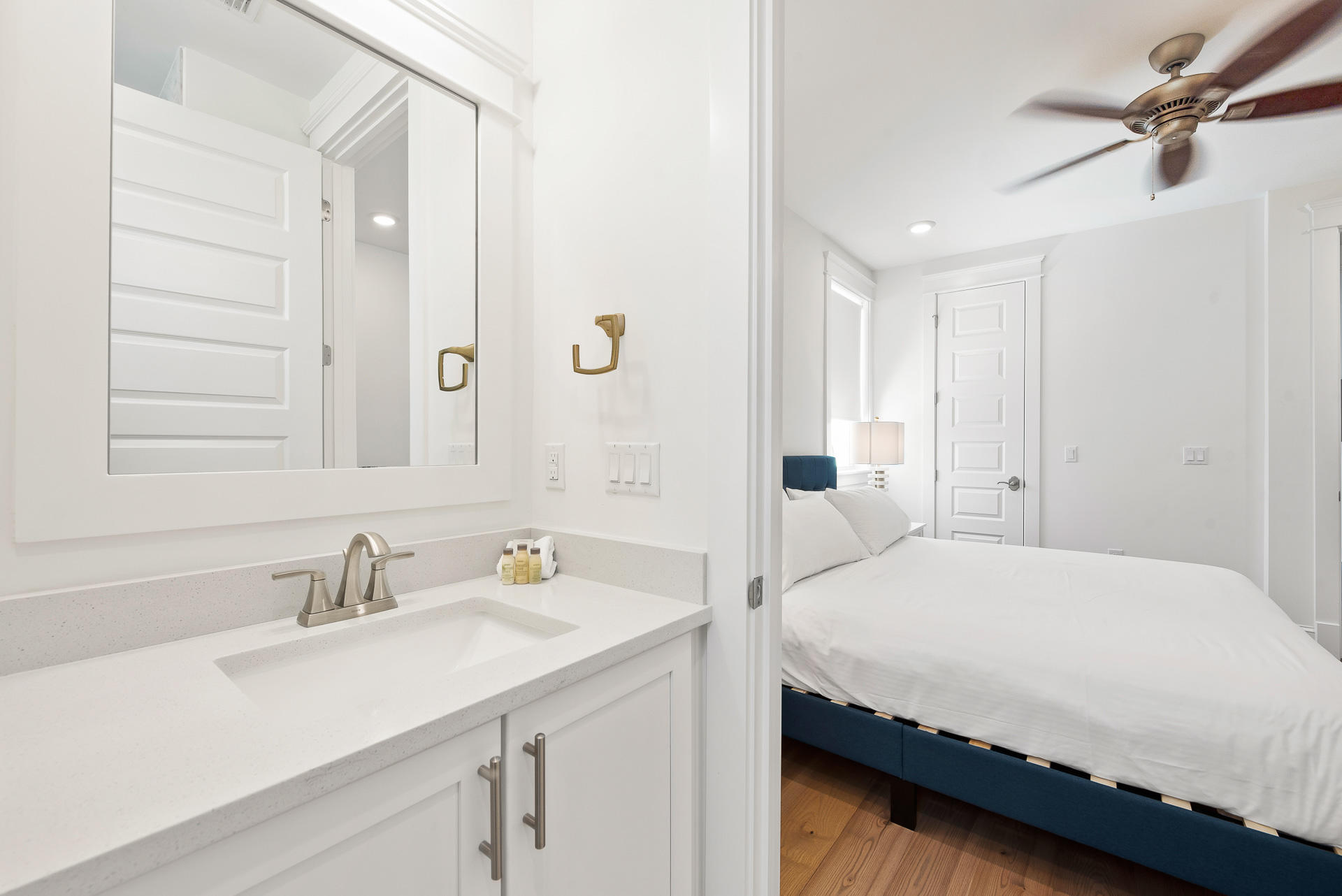 39 Candlehouse Ln Inlet Beach Inlet Beach, FL 32461 - Photo 22 of 26 a bedroom with a sink and a mirror