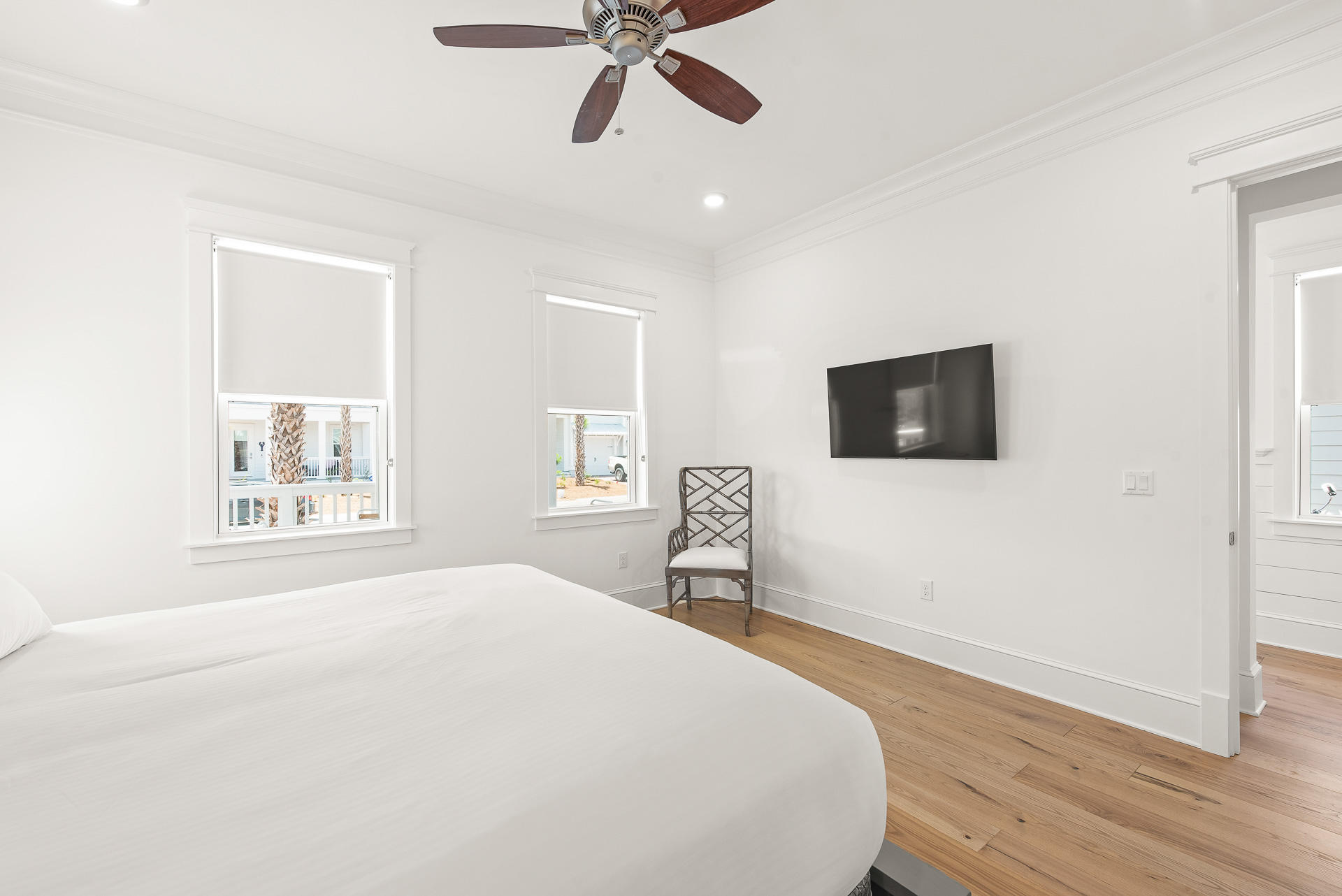 39 Candlehouse Ln Inlet Beach Inlet Beach, FL 32461 - Photo 10 of 26 a bedroom with a bed and a tv on the dresser