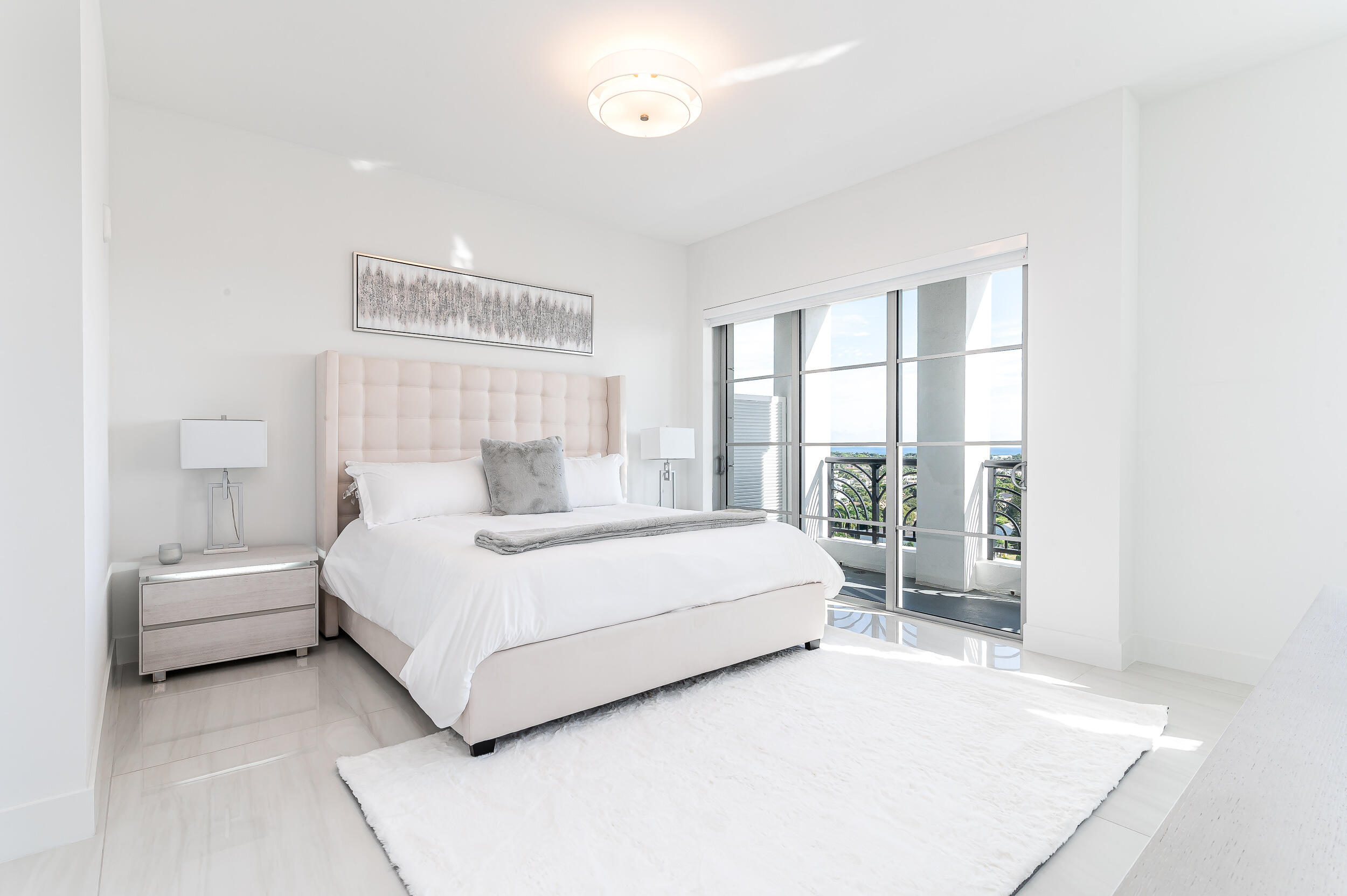 155 East Boca Raton Road, Unit 1103 Boca Raton, FL 33432 - Photo 20 of 57 a large white bed in a white room