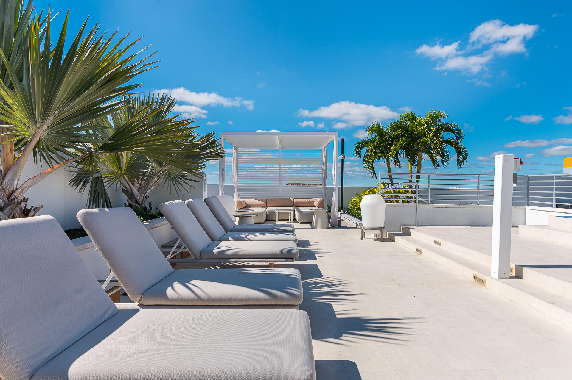 155 East Boca Raton Road, Unit 1103 Boca Raton, FL 33432 - Photo 41 of 57 a view of a patio with swimming pool