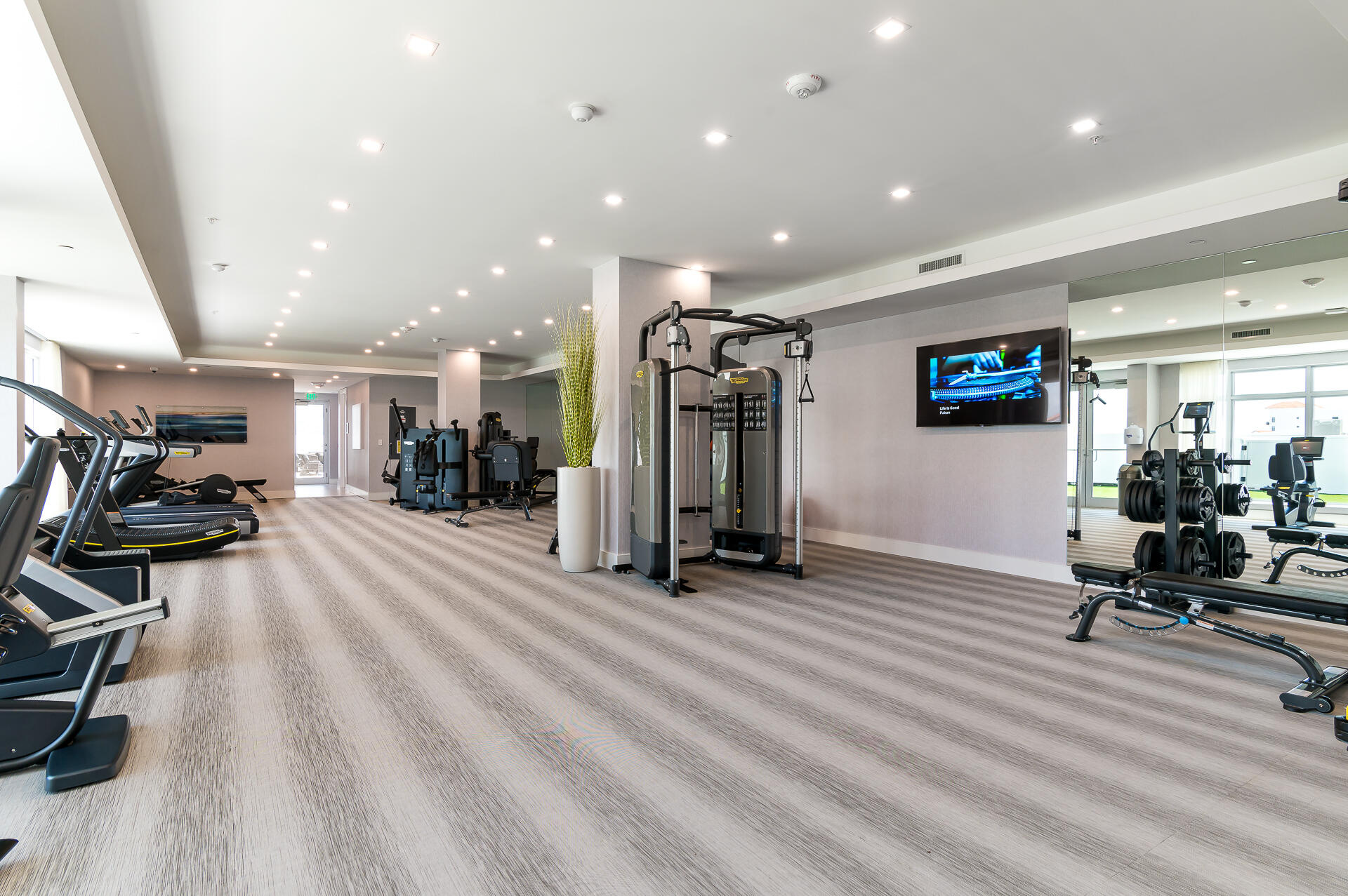155 East Boca Raton Road, Unit 1103 Boca Raton, FL 33432 - Photo 45 of 57 a view of a room with gym equipment