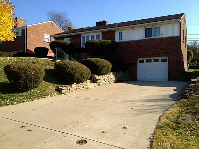 Exterior Front. Nice Curb appeal with newer Bay Window, and newer Cement Driveway