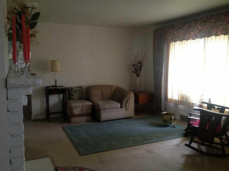 1817 Borland Road Pittsburgh, PA 15243 - Photo 7 of 19 Living Room. Nice Size Living Rm with wood burning fireplace. Hardwood under carpet.