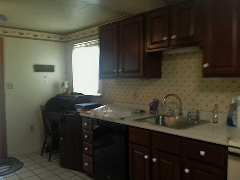 1817 Borland Road Pittsburgh, PA 15243 - Photo 9 of 19 Kitchen. Another View of large kitchen. Room for a desk at end of cabinets.