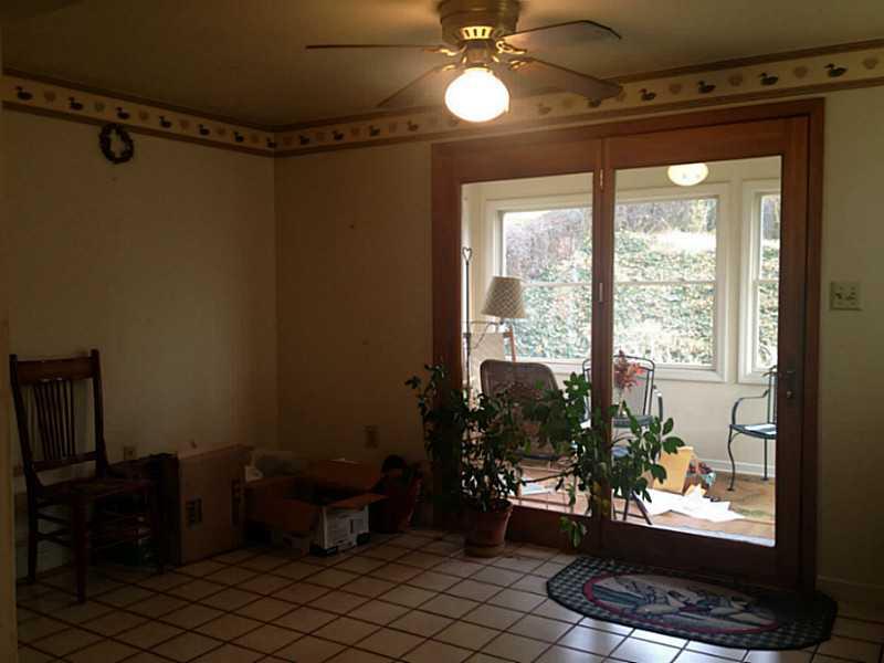 1817 Borland Road Pittsburgh, PA 15243 - Photo 10 of 19 Kitchen. Kitchen is large enough for a table with 6 chairs. This is wider than rest of kitchen.