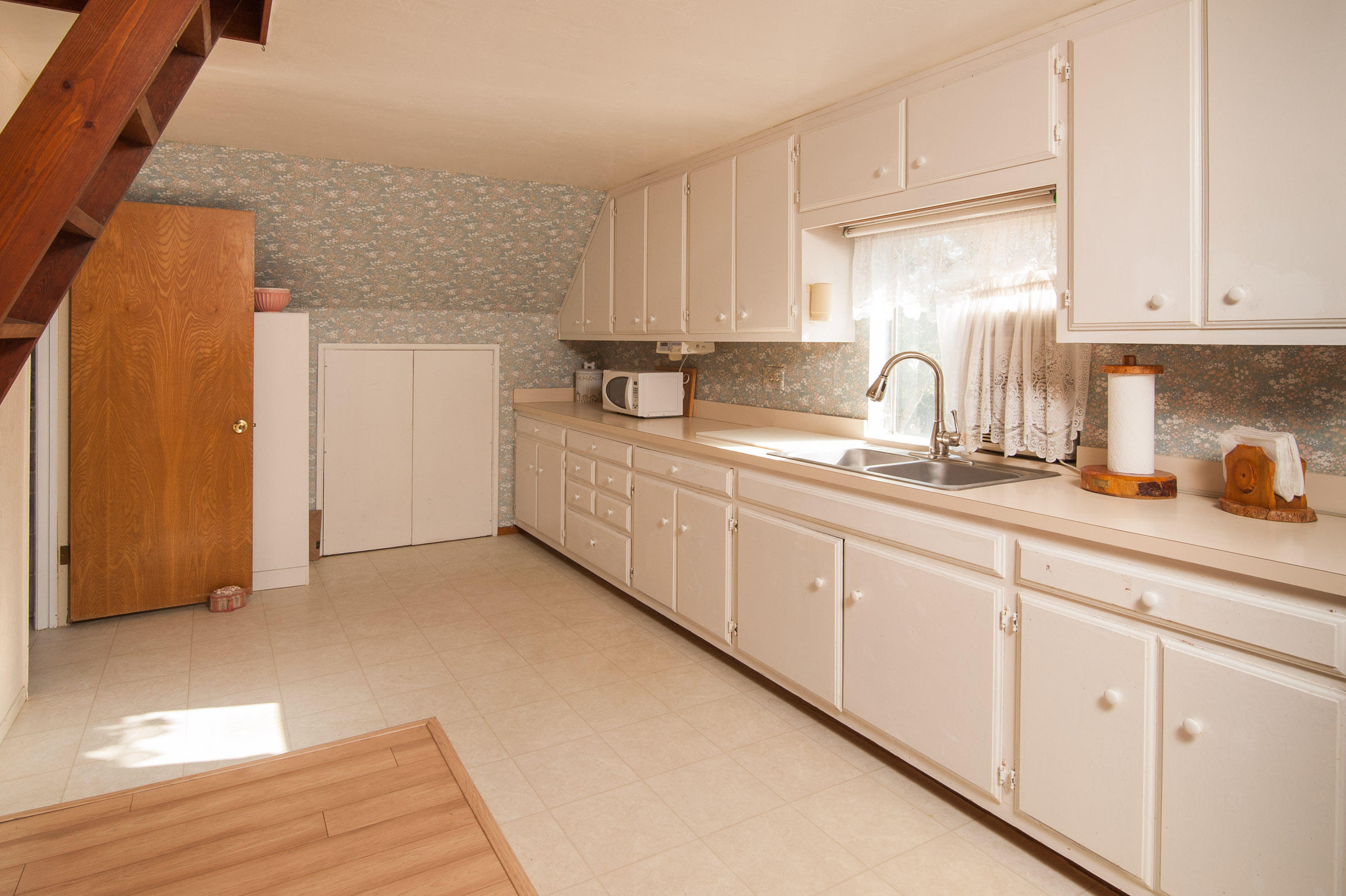 2620 Janin Way Solvang, CA 93463 - Photo 22 of 24 a kitchen with sink and cabinets