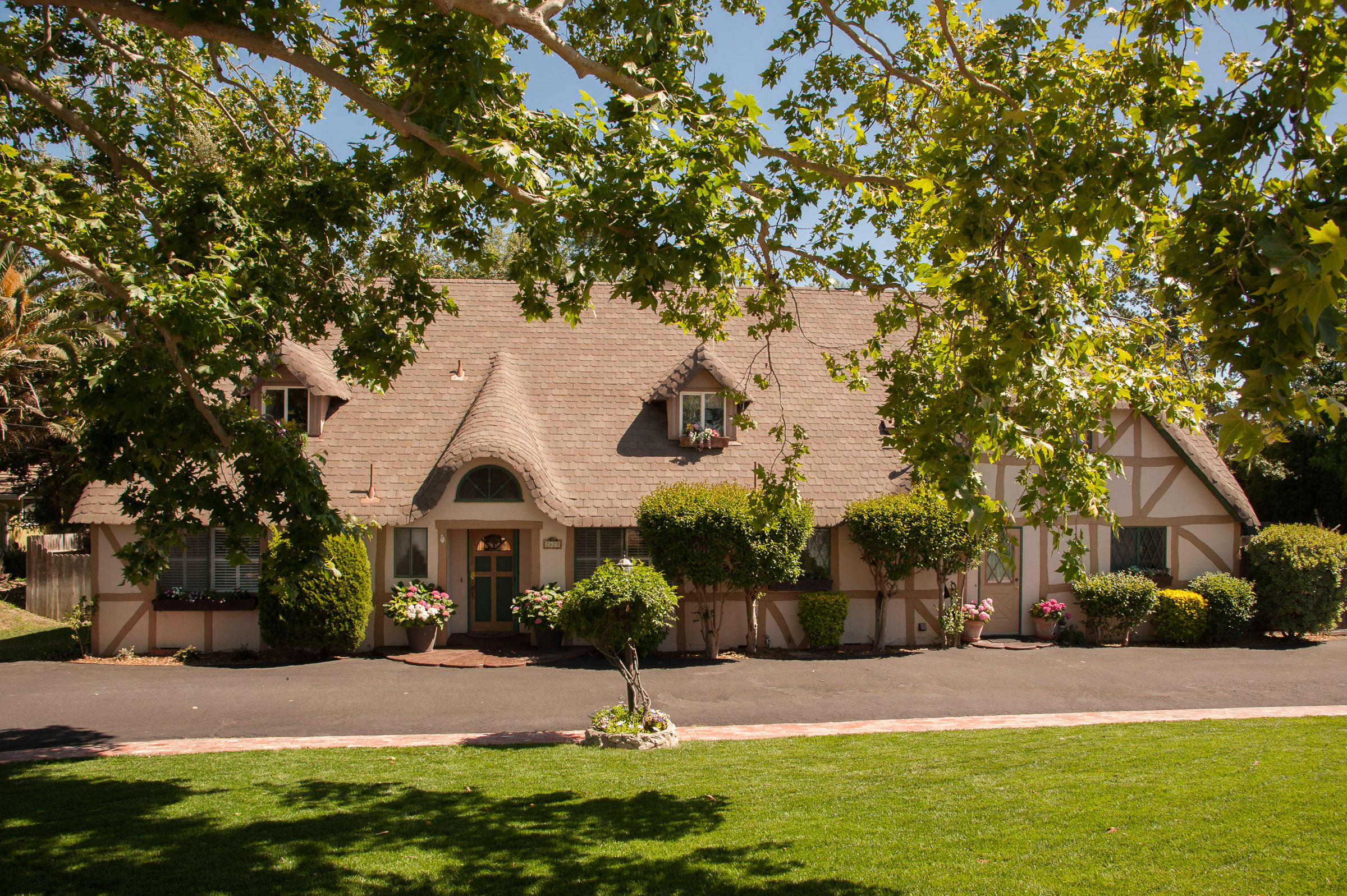 2620 Janin Way Solvang, CA 93463 - Photo 3 of 24 a front view of a house with a yard and garage