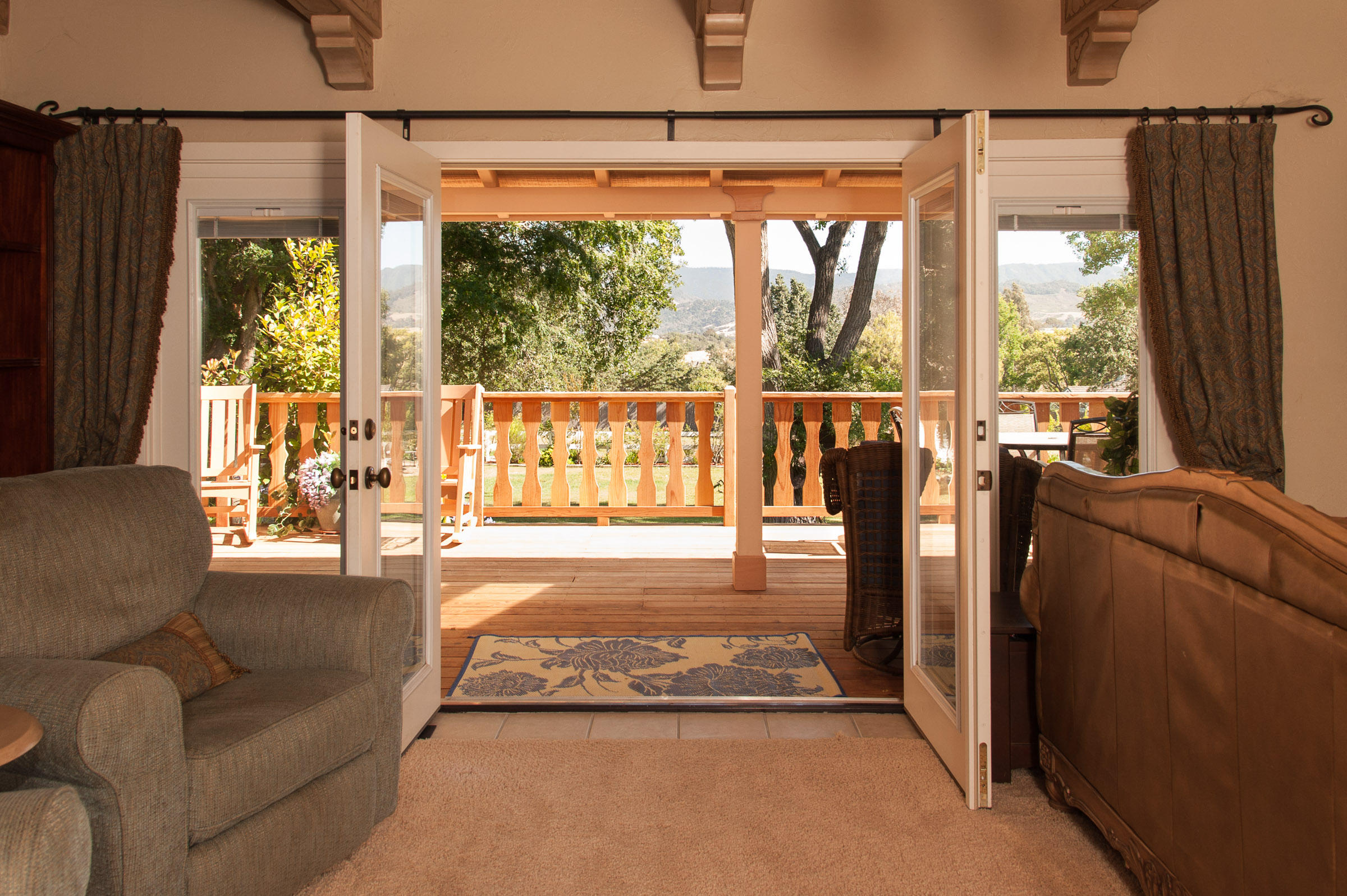 2620 Janin Way Solvang, CA 93463 - Photo 6 of 24 a living room with furniture and a floor to ceiling window