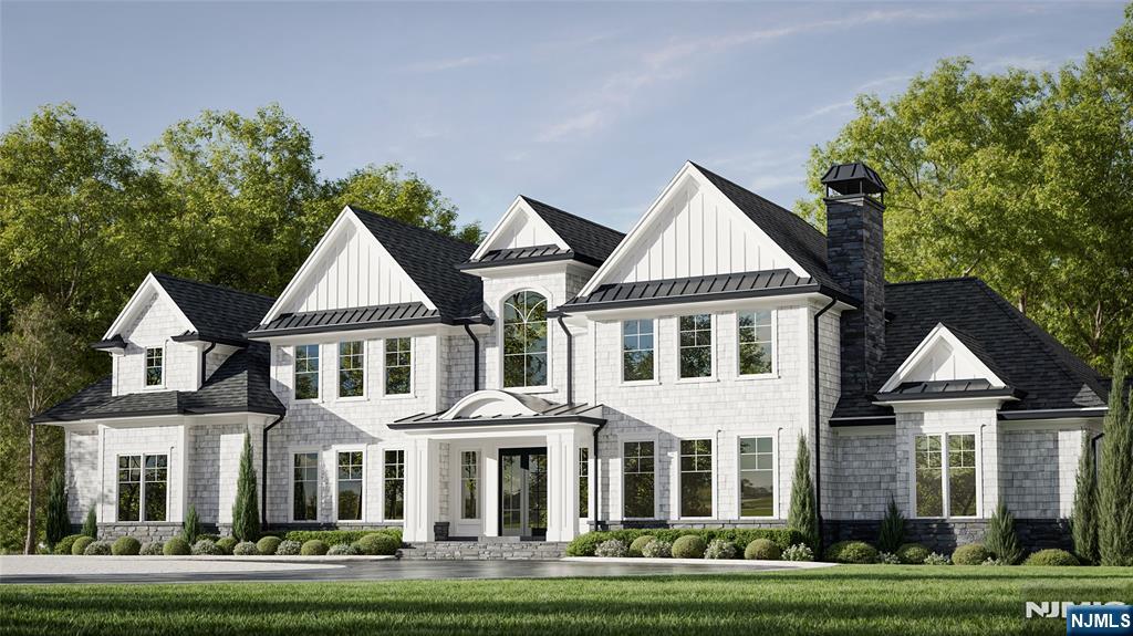 104 Chestnut Ridge Road Saddle River, NJ 07458 - Photo 2 of 4 front view of a house with a yard