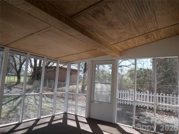 a porch with a glass door