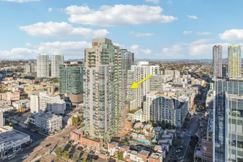a view of a patio with couches and a table and chairs
