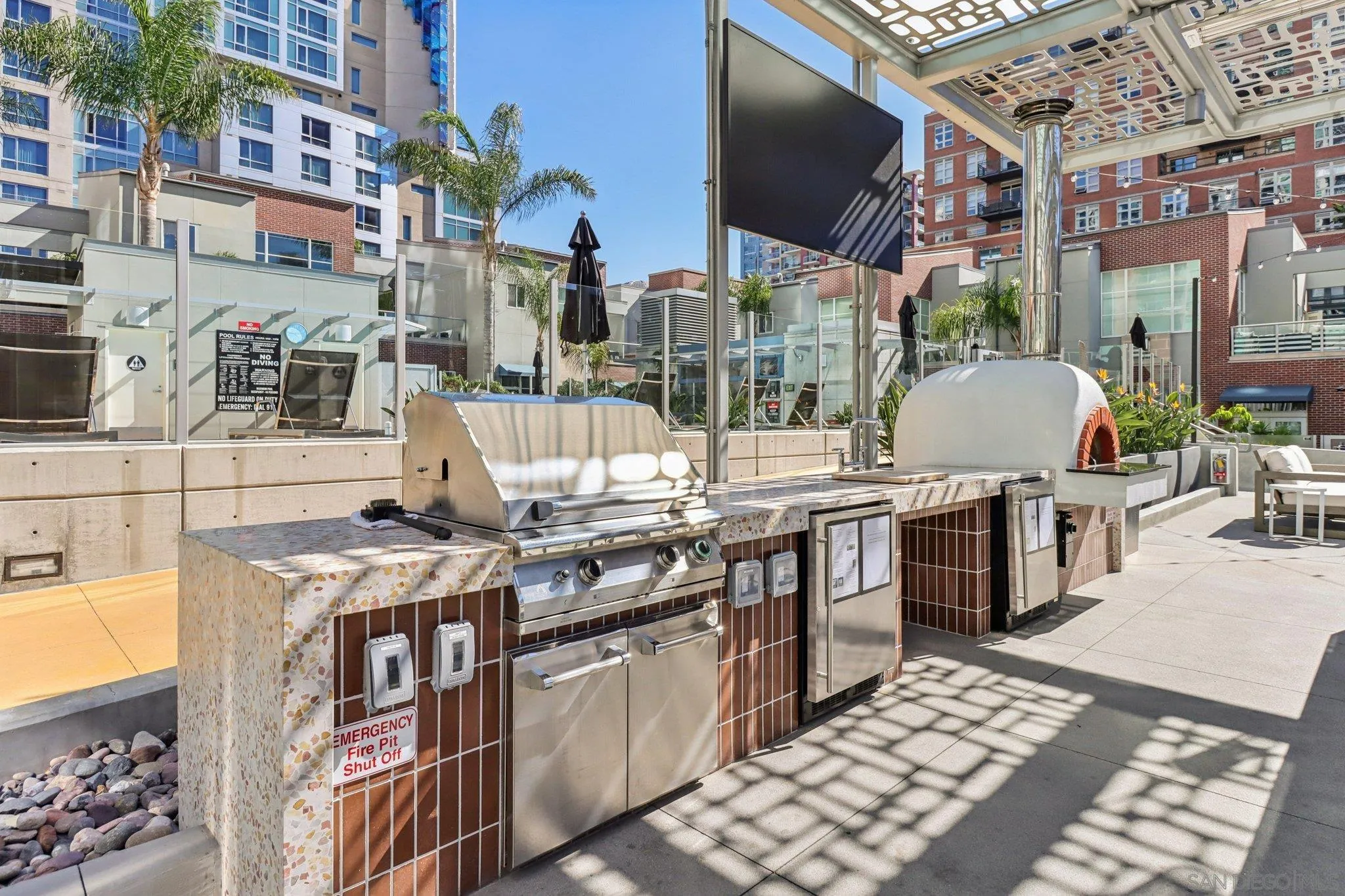 800 The Mark Lane, Unit 1606 San Diego, CA 92101 - Photo 42 of 50 a outdoor space with lots of tables and chairs