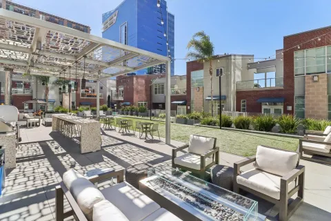 a view of swimming pool with outdoor seating