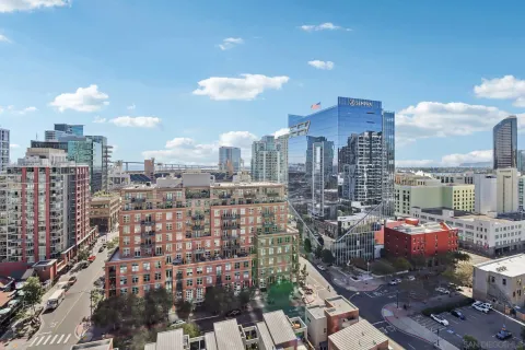 a view of city with tall buildings