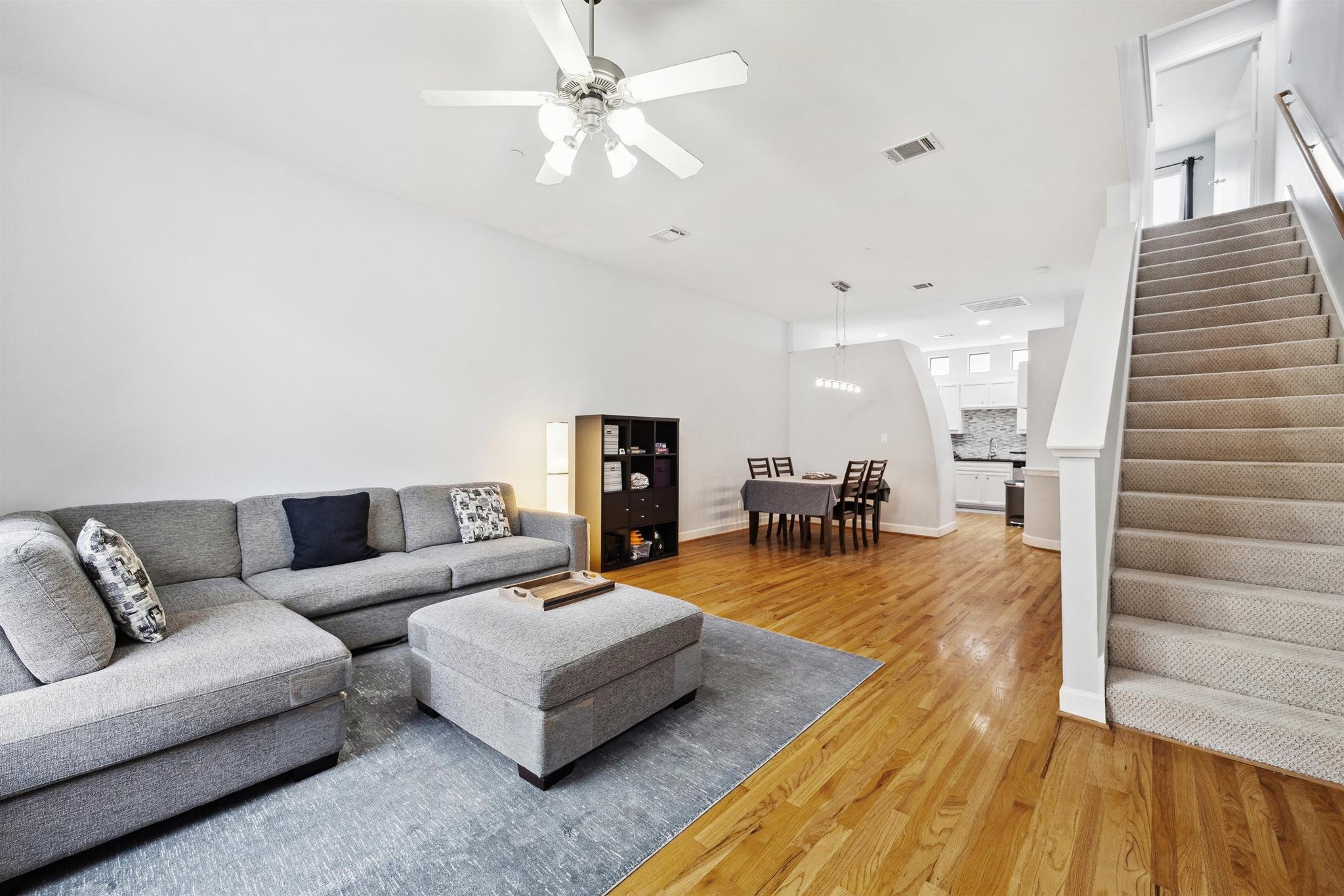 11315 South Main Street, Unit 1401 Houston, TX 77025 - Photo 4 of 14 a living room with furniture and a chandelier