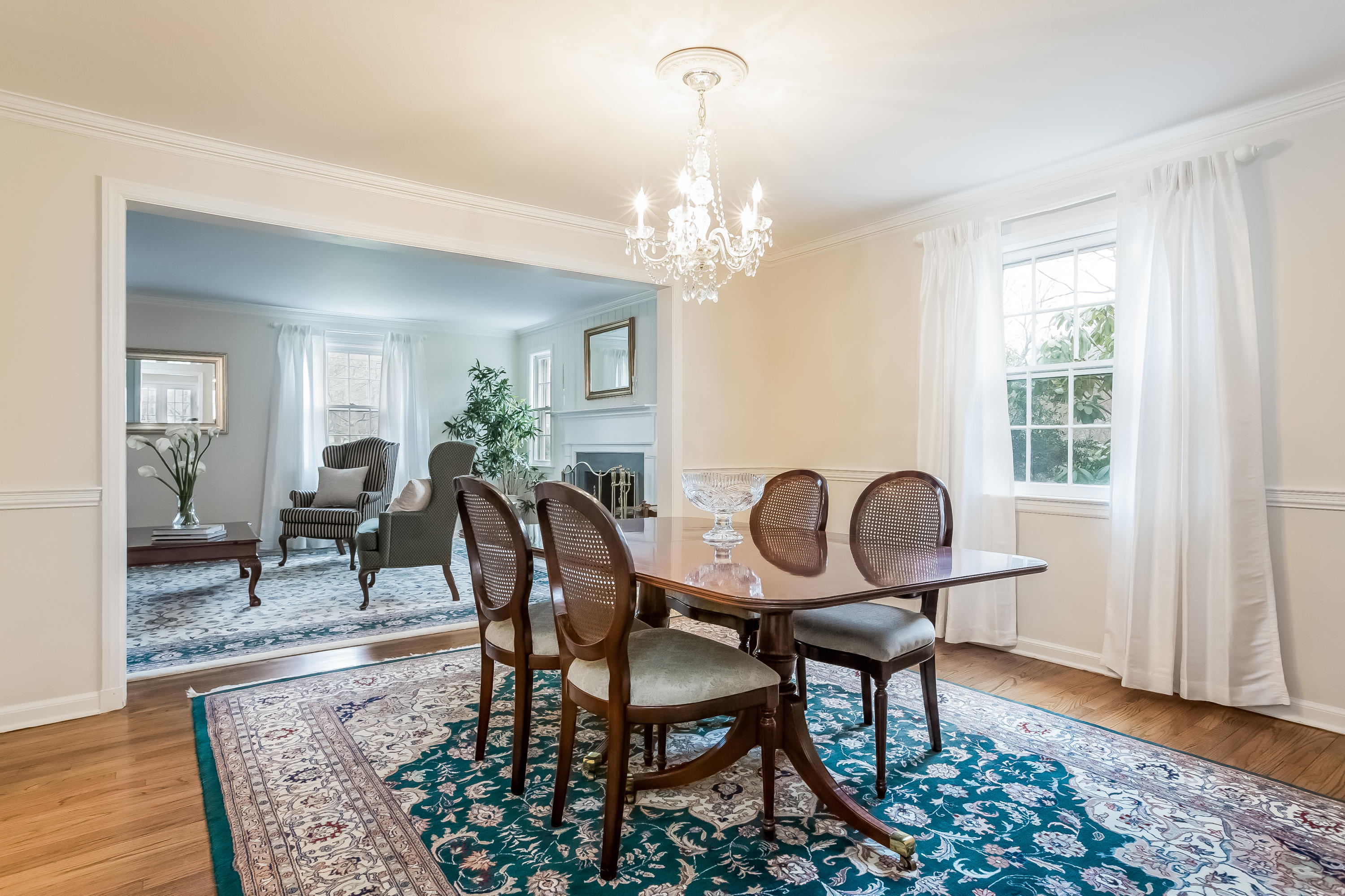 132 Colony Road Darien, CT 06820 - Photo 5 of 25 a view of a dining room with furniture window and wooden floor