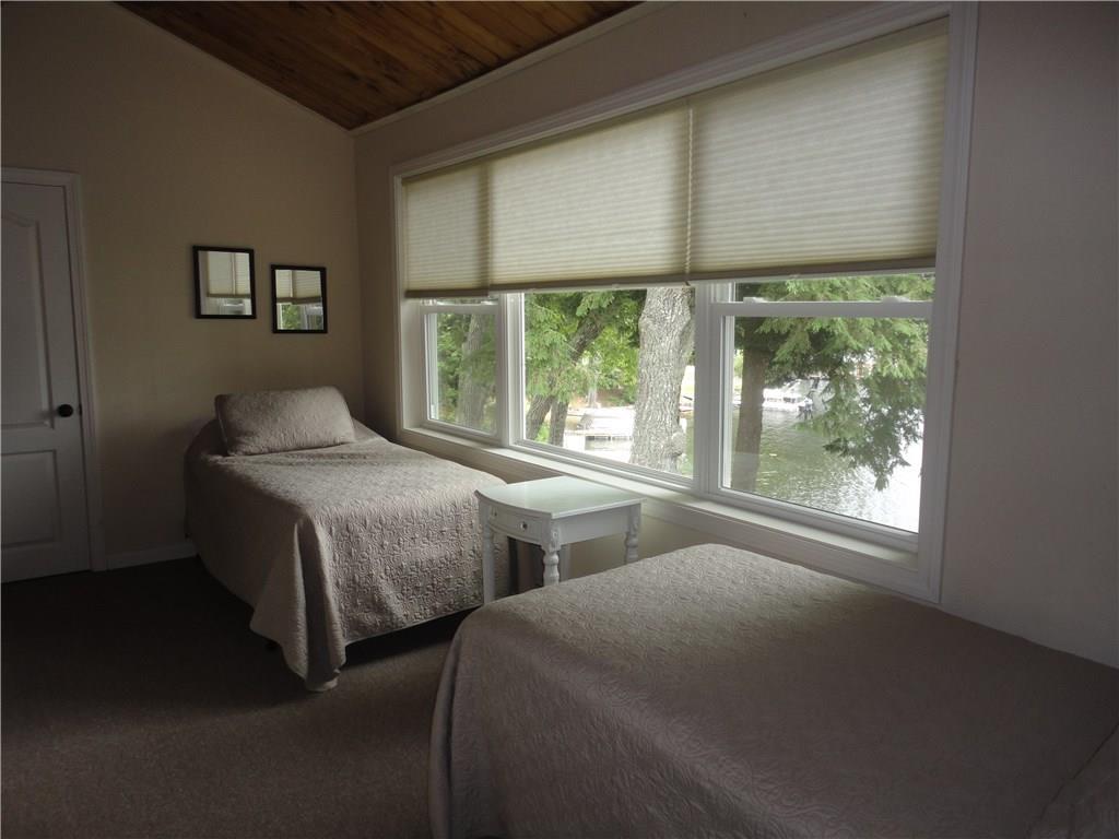 128 Pine Point Road Oxford, ME 04270 - Photo 22 of 35 Second floor bedroom lakeside