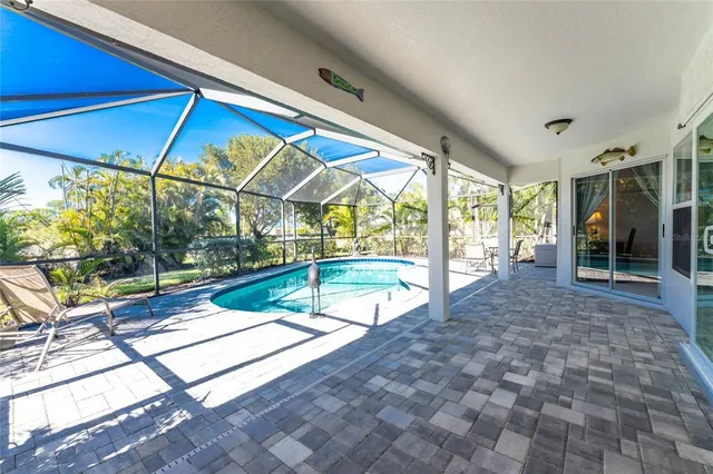 a view of a patio with a backyard