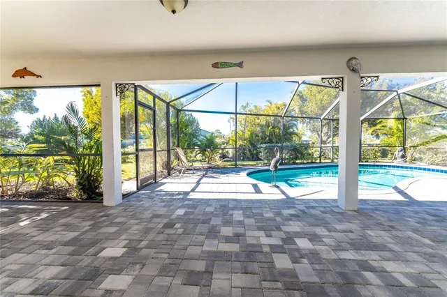 a view of front door and porch with a floor to ceiling window