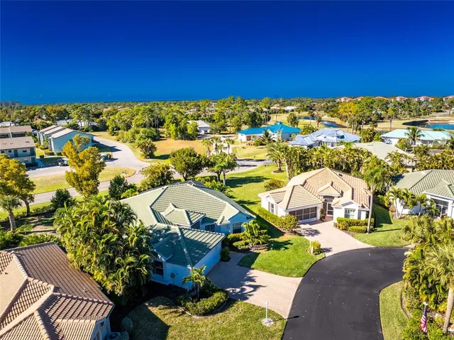 a view of a balcony with chairs
