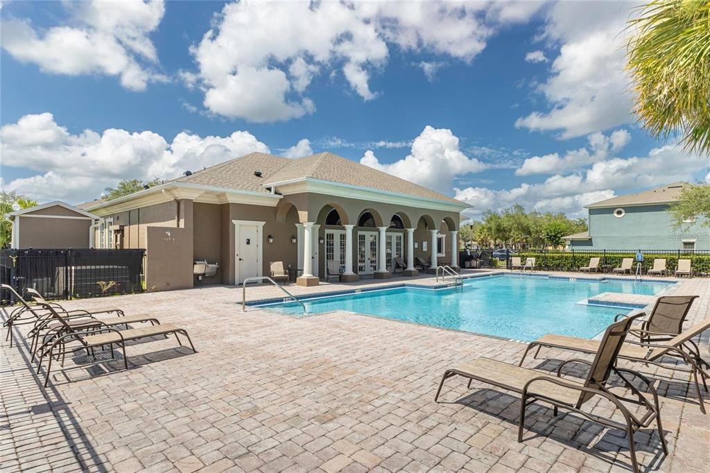 3309 Wilshire Way Road, Unit 3 Orlando, FL 32829 - Photo 32 of 43 a view of a house with swimming pool and sitting area