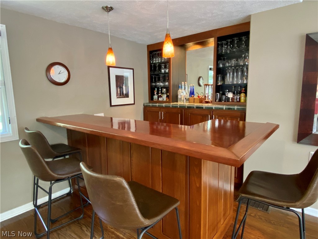1664 Burbank Road Wooster, OH 44691 - Photo 9 of 35 Pony up to the wet bar with mini fridge and enjoy your guests in the Great Room