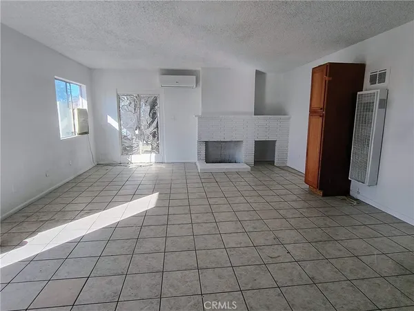 a view of a livingroom with a furniture