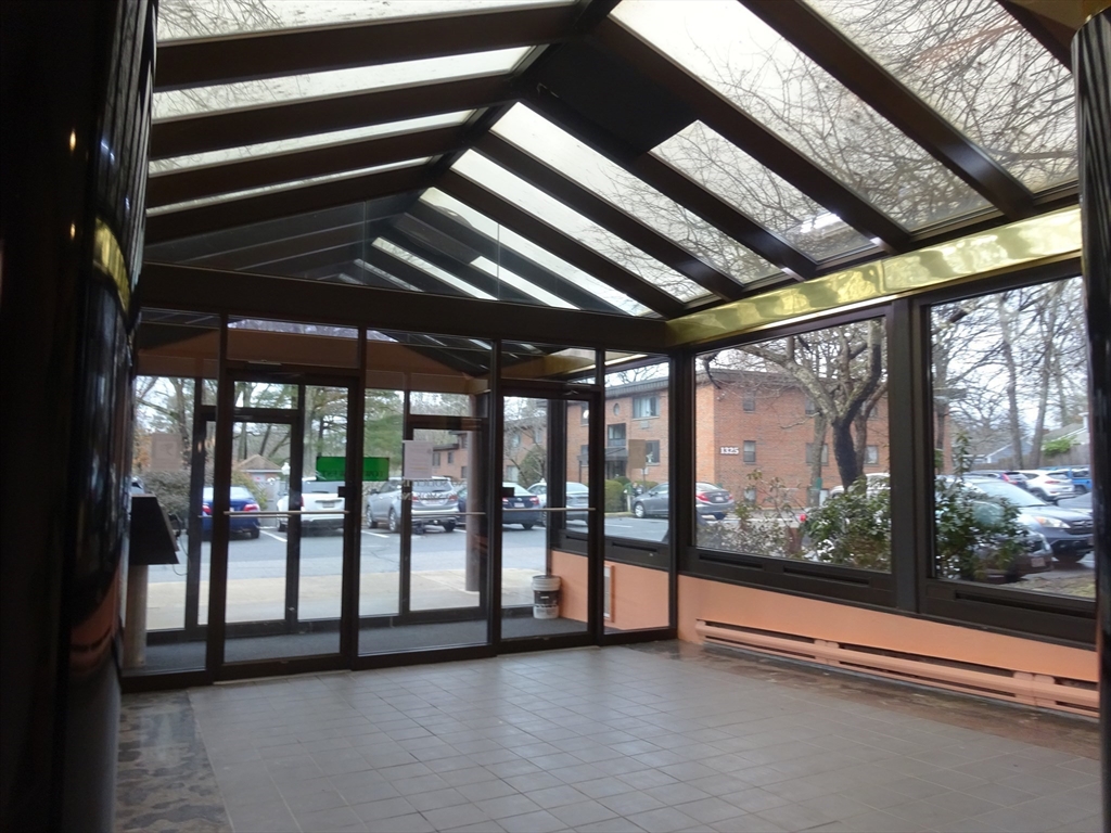 1321 Worcester Road, Unit 610 Framingham, MA 01701 - Photo 2 of 30 a view of lobby with floor to ceiling window