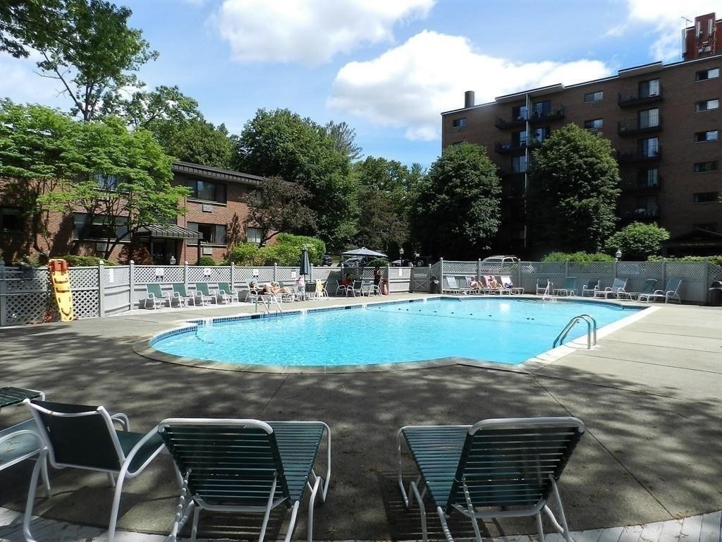 1321 Worcester Road, Unit 610 Framingham, MA 01701 - Photo 28 of 30 a view of a swimming pool with a patio