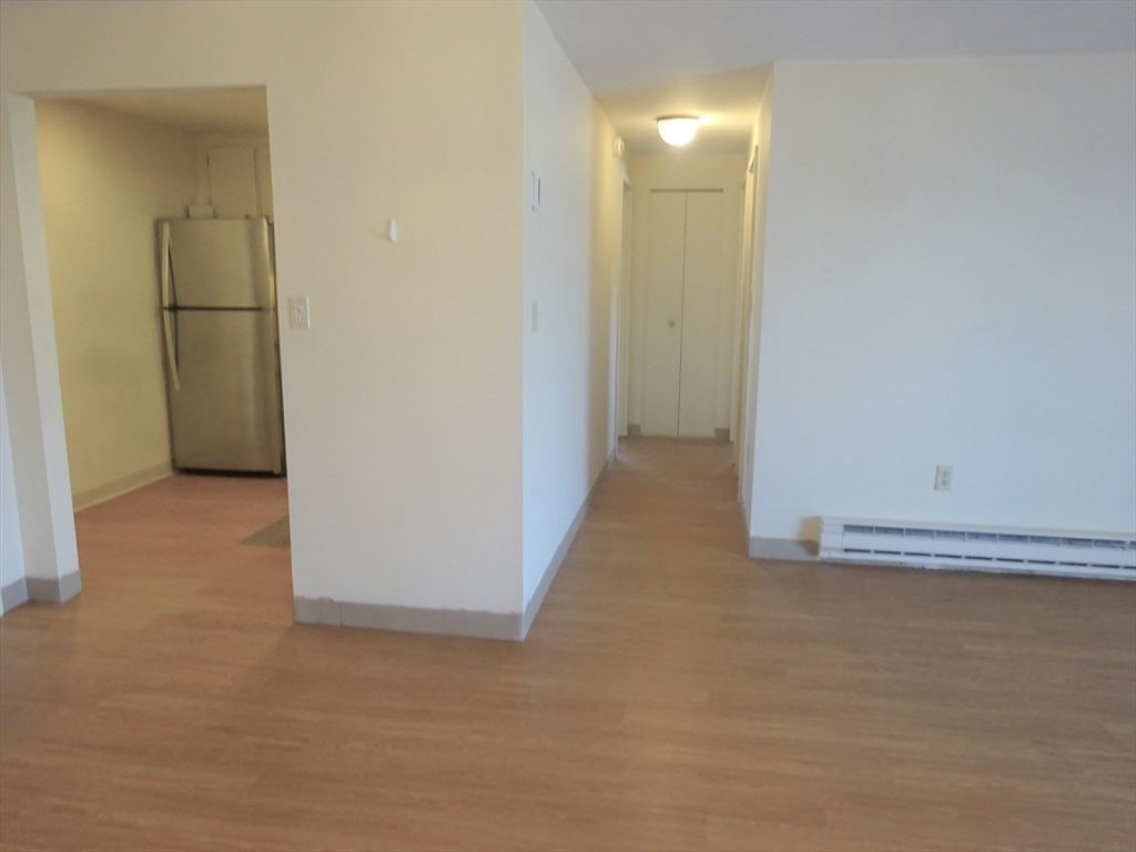 1321 Worcester Road, Unit 610 Framingham, MA 01701 - Photo 10 of 30 a view of a room with a hallway