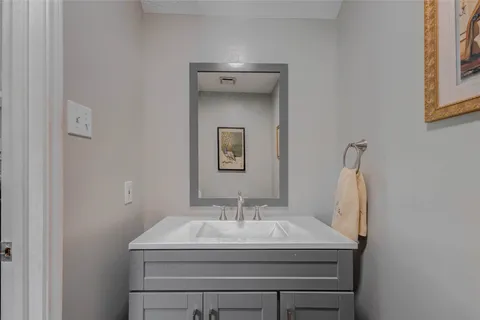 a bedroom with a bed furniture and a window