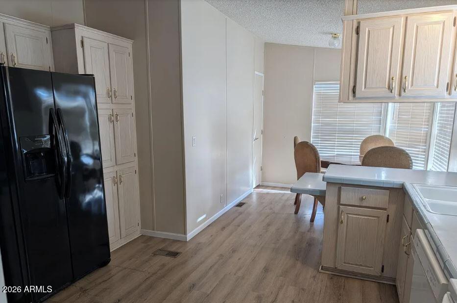 2000 South Apache Road, Unit 223 Buckeye, AZ 85326 - Photo 5 of 19 a work place with furniture and wooden floor