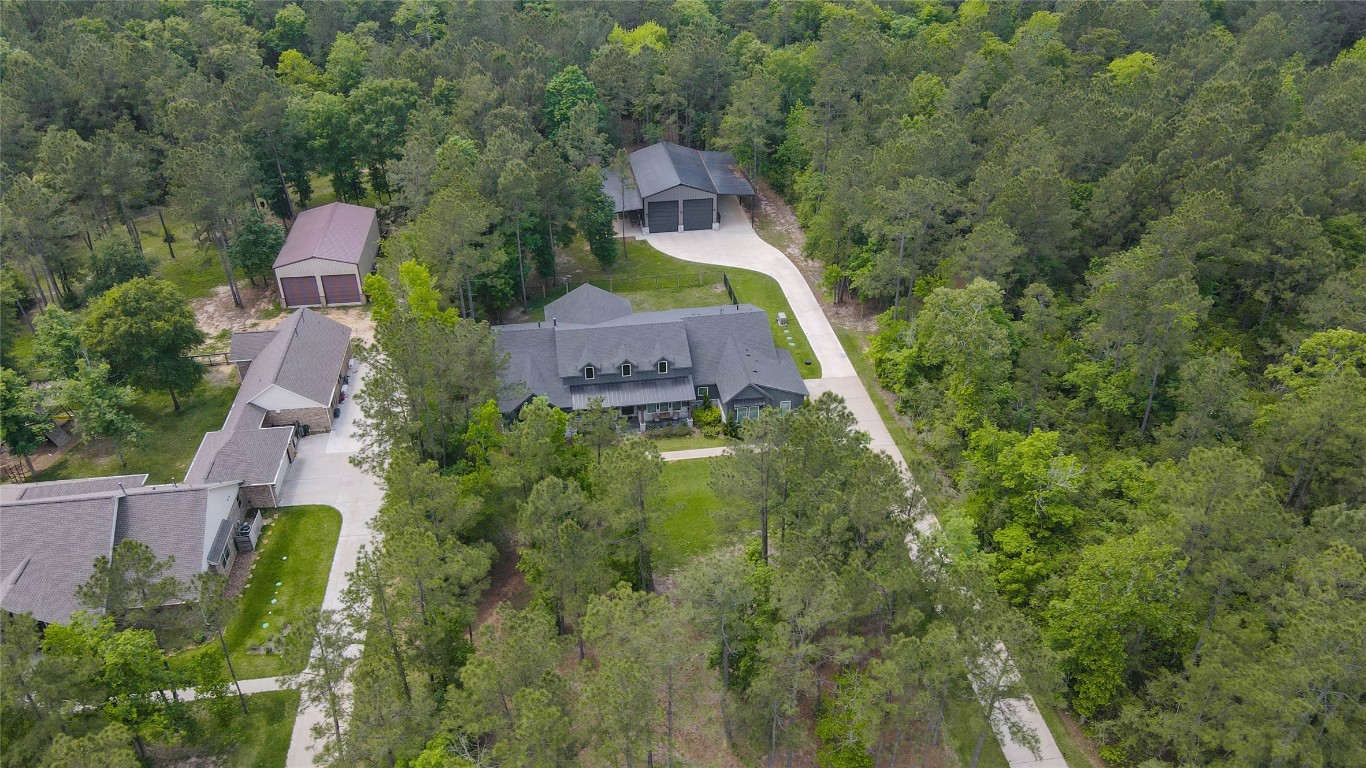 10774 Ruger Road Willis, TX 77378 - Photo 10 of 33 an aerial view of a house