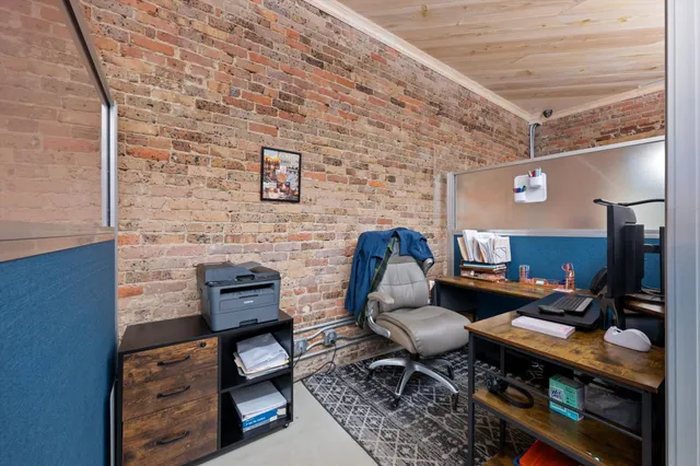 a reading room with furniture and wooden floor