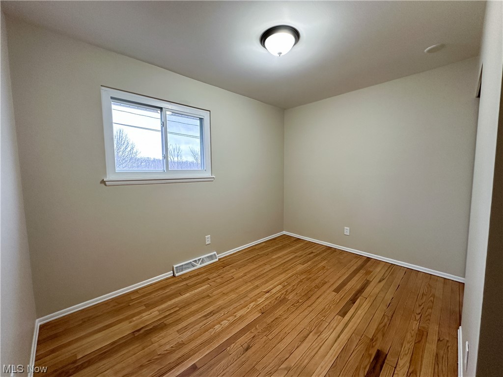 615 Liberty Road Youngstown, OH 44505 - Photo 12 of 22 Bedroom featuring light hardwood flooring
