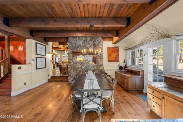 a view of a living room and entry way