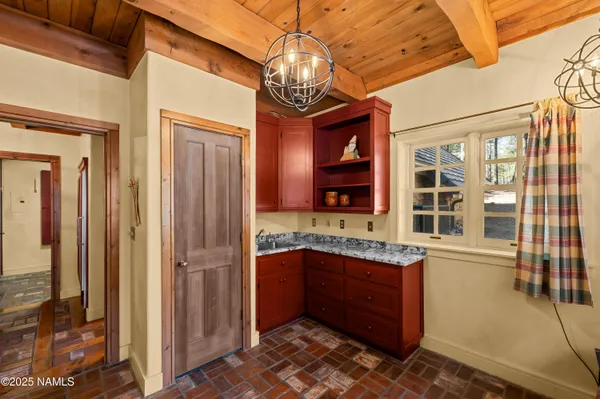 a view of a mountain in the distance in a field