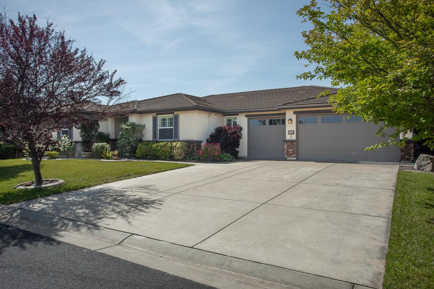 2042 Danforth Way Plumas Lake, CA 95961 - Photo 1 of 56 a front view of house with yard and green space