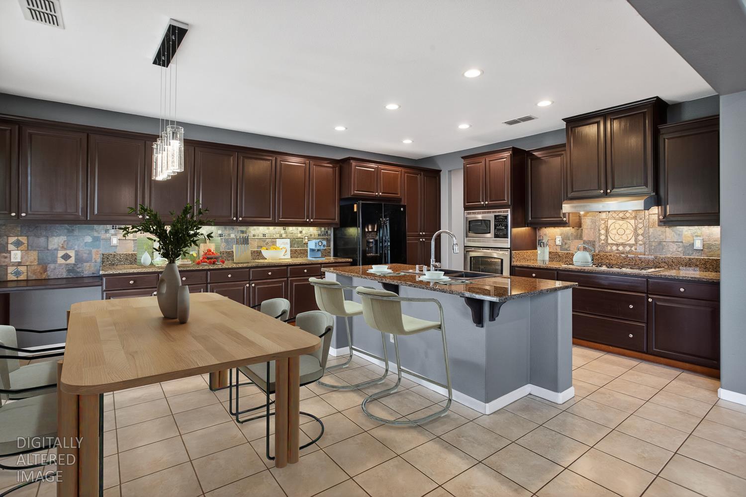 2042 Danforth Way Plumas Lake, CA 95961 - Photo 15 of 56 a kitchen with a sink refrigerator and cabinets