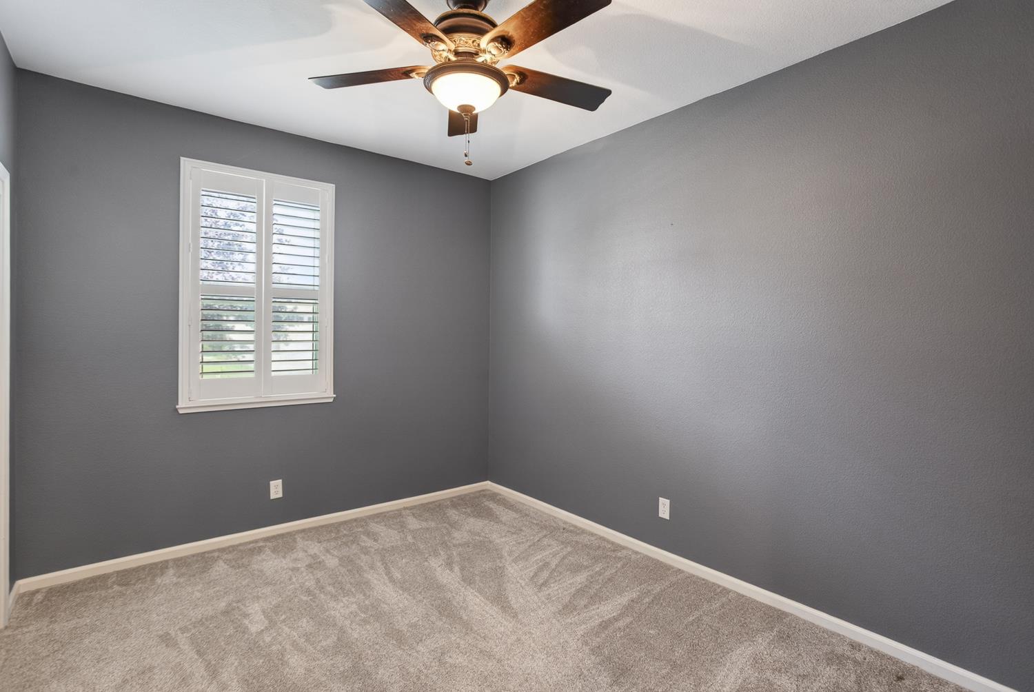 2042 Danforth Way Plumas Lake, CA 95961 - Photo 20 of 56 an empty room with a window and a fan