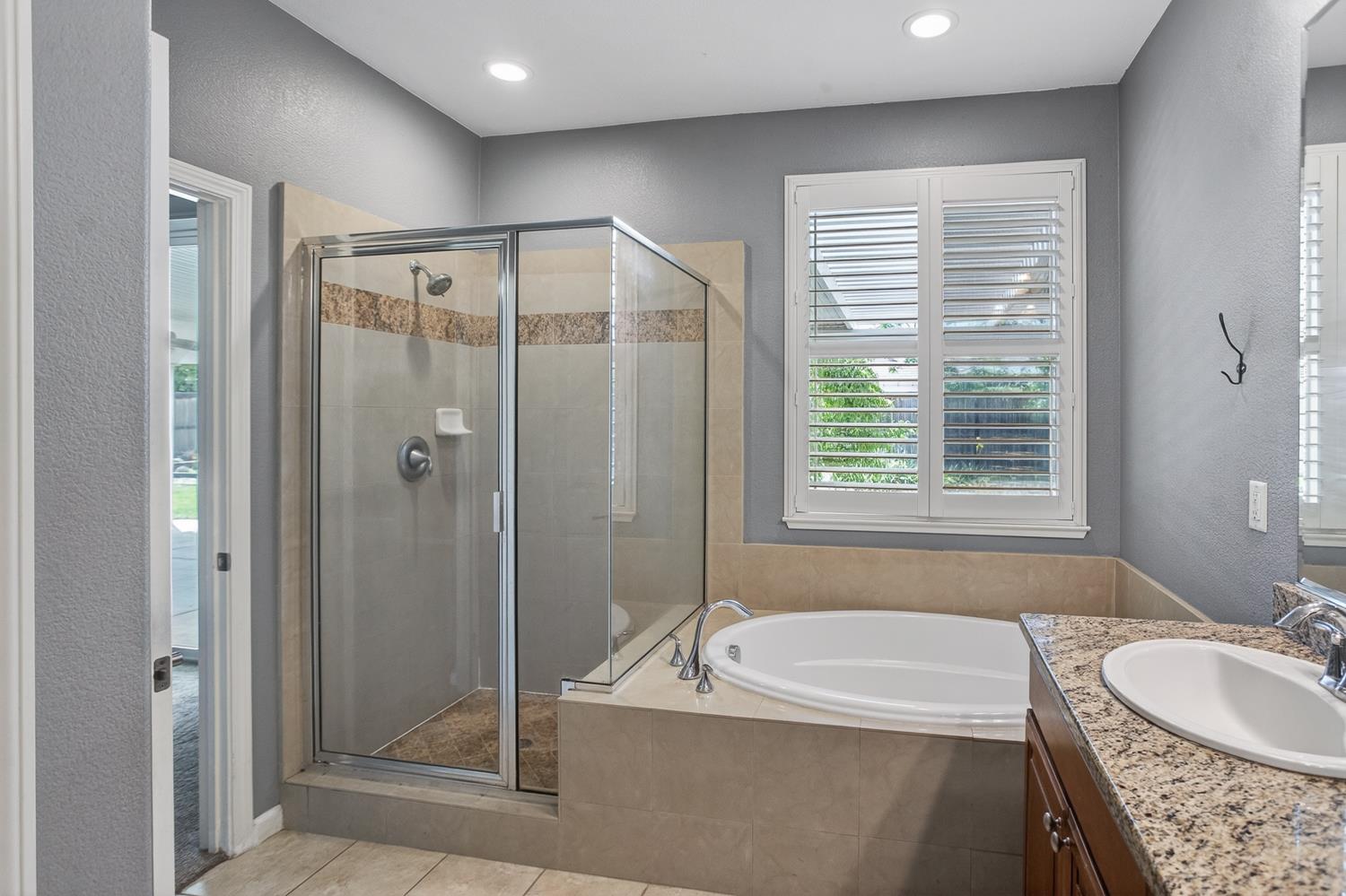 2042 Danforth Way Plumas Lake, CA 95961 - Photo 41 of 56 a spacious bathroom with a tub shower and sink